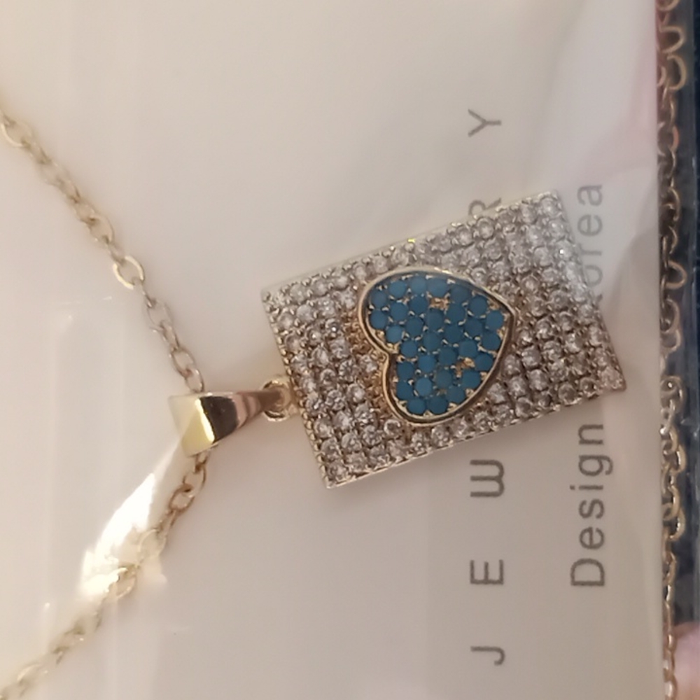 pave' heart goldtone necklace
